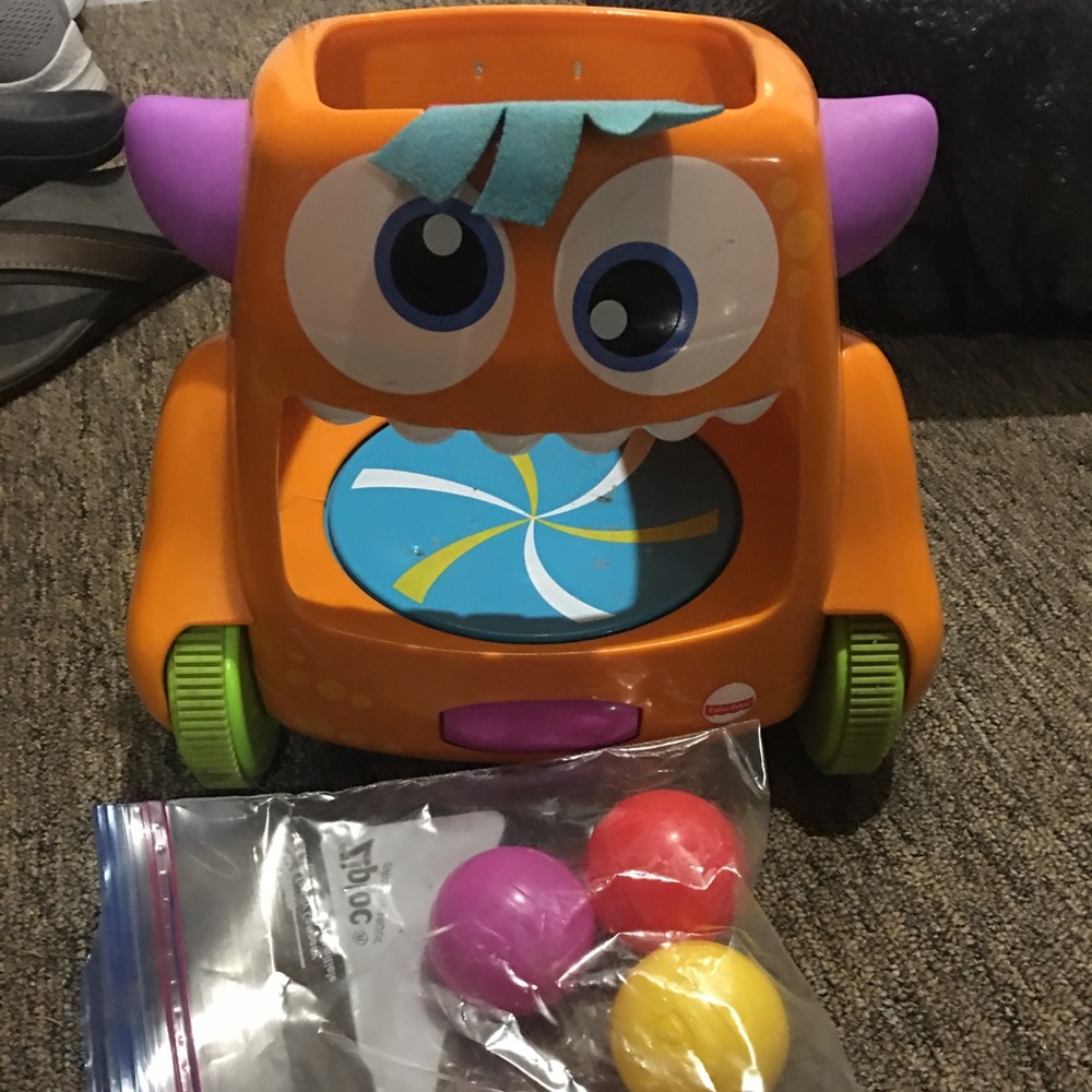 Fisher price rolling monster toy